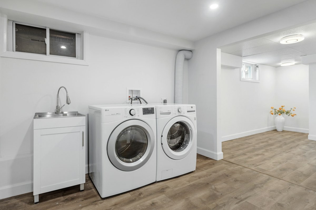 Front-loading washing machine and dryer in a home laundry room